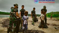 Satgas TMMD Kodim 1710/Mimika Aksi Bersih Pantai Keakwa